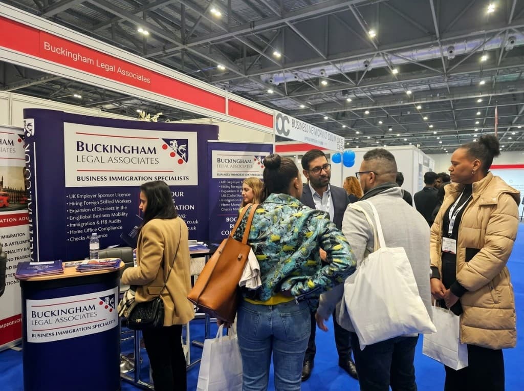 Buckingham Legal Associates team at a business immigration exhibition