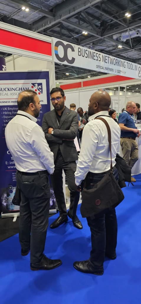 Professional networking conversation at a trade show